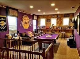 Decorating a man cave with gear from your favorite team is easy enough but a complete sports bar theme will stay fresh for any season. A Stunning Lakers Room A Lifetime In The Making Basketball Man Cave Man Cave Home Bar Man Cave Room