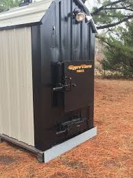Hyprotherm Outdoor Wood Boiler With 21 Colors Available At No Charge Wood Furnace Wood Burning Furnace Outdoor Wood Burning Furnace