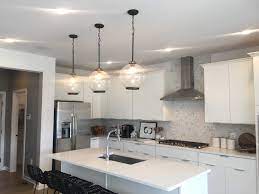 Add A Farmhouse Touch To Your Modern Kitchen Designs With Glass Orb Lights Modern Kitchen Design Kitchen Design Modern Kitchen
