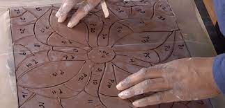 To make a mosaic, start by getting some pieces of glass, stone, porcelain, or any other material you want to use for your mosaic. Make Your Own Ceramic Mosaic Table Top Ceramic Arts Network