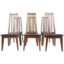 This modern dining chair is ultra modern while retaining a vintage feel reminiscent of the victorian era. Mid Century Danish Modern Tall Teak Wood Spindle Back Dining Chairs For Sale At 1stdibs
