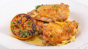 Chef Andrew Zimmern Shares His Recipe For Buttery Lemon Chicken Thighs One Of His Favorite Comfort Fo Lemon Chicken Thighs Poultry Recipes Food Network Recipes
