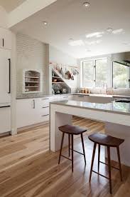 5 Ideas To Steal From A Beautiful Boston Kitchen Sleek Kitchen Wood Floor Kitchen White Modern Kitchen