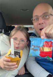 Enjoying a McFlurry with Father-Daughter Duo