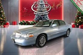 Image result for Light Ice Blue 2010 Town Car
