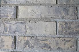 Whitewash brick fireplace with gray paint. How To Whitewash A Brick Fireplace Life Family Joy
