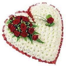 Funeral hearts sending a floral heart tribute to a funeral makes a deeply personal statement and is indicative of the love and compassion felt by immediate family or the closely bereaved. Hearts Christines Florist Ipswich Suffolk