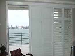 We have specialty window shutters like arches and angled tops. Plantation Shutters For Sliding Glass Door Traditional Living Room Miami By Rockwood Shutters Houzz