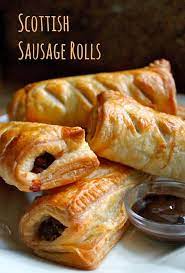 Homemade sausage rolls are a british dietary staple and convenience food that are usually enjoyed as a snack, in miniature form for buffet and party food, or served as a meal with fresh peas and chips. Homemade Scottish Sausage Rolls Great For A Snack Or A Meal Christina S Cucina