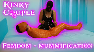 Femdom goddes plays with mummified chastity sissy slave
