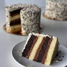 Black And White Layer Cake Recipe In 2021 White Layer Cake Carlos Bakery Cake Boss Recipes