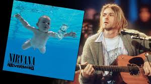 The underwater baby on the cover of nirvana's nevermind album is now asking how low the grunge band may have stooped to produce the album art and is suing the artists for damages. Rdjodisxjidjkm
