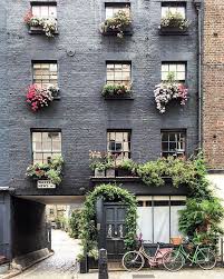 16 Paint Colors That Will Instantly Liven Up Your Home Painted Brick Window Box Exterior Paint