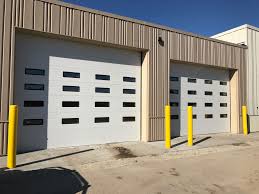 Pin By Quality Overhead Door On Commercial Garage Doors Garage Doors For Sale Commercial Garage Doors Garage Doors