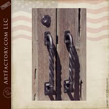 Contemporary to ornate design door pulls for residential and commercial doors. Twisted Iron Door Pulls Hand Forged By Master Blacksmiths