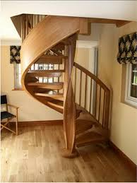 Craftsmen designing, fabricating & installing incredible bespoke stairs worldwide! Furniture The New Spiral Staircase With Slide By Using Wooden And Stone Decoration The Interesting Design Of Spiral Staircase With Slide And Using Wooden Matter Also The Brown Wall And The Laminating