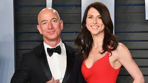 Behind his back is his wife or girlfriend doing chores around the house. Jeff Bezos Is Proud Of Ex Wife S Pledge To Give Away Over Half Of Her 35 Billion Fortune Go Get Em Mackenzie Marketwatch