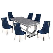 Dining room chair sets whilst one or two chairs may be suitable for a small table, you will probably require a larger set for a family home or a special occasion, such as a dinner party. Chelsea 1 8 Marble Dining Table Luxury Blue Velvet Quilted Back Lion Head Dining Chairs The Furniture Mega Store
