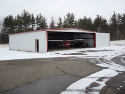 50 X 50 Steel Airplane Hangar With Sliding Door Pre Engineered Metal Buildings Metal Buildings Steel Buildings
