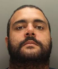 Dad walked into police station with loaded gun linked to shooting