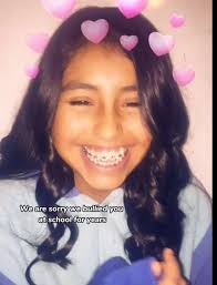 Boy Taking Video of Rosalie Avila