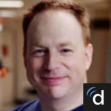 Dr. Adam C. Booser, MD