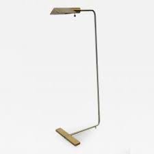 The base of this table is constructed like a piece of fine jewelry, beautiful craftsmanship and elegant design. Cedric Hartman Cedric Hartman Brass And Chrome Floor Lamp