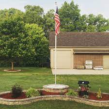 Maybe you would like to learn more about one of these? Flag Pole And Block Flower Bed Garden Flag Pole Flag Pole Landscaping Front Yard Flower Bed