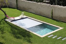 Piscine Revetue D Un Liner Olive Et Equipee D Une Couverture Automatique Immergee Poolsuccess Avec Caillebotis Bois Ipe Apf Caillebotis Bois Bois Ipe Piscine