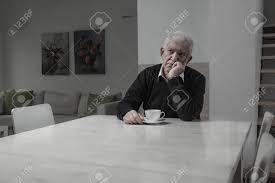 Senior Sad Lonely Man And His Coffee Time Stock Photo, Picture And Royalty  Free Image. Image 38884685.