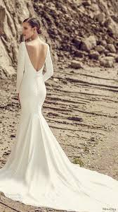 Mikaella Spring 2017 Bridal Long Sleeves Bateau Neckline Simple Clean Design Elegant Fit And F Long Wedding Dresses Wedding Dresses Fit And Flare Wedding Dress