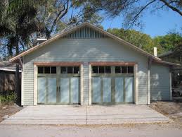 This featured two story garage in new jersey has two shed dormers with large horizontal sliding windows making room for a garage with apartment space on the second floor with parking for a car on the first floor. Two Car Garage With Shed Extension Historic Shed