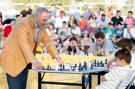.garry kasparov who, among his many achievements, mentored the young magnus carlsen. Garry Kasparov Play Chess With Children In Greece Aristidis Vafeiadakis