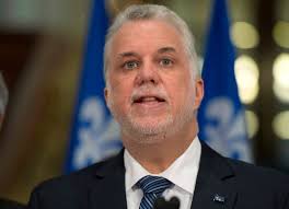 Philippe Couillard defends Bombardier bailout, angering public sector  strikers