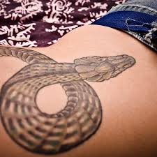 Maybe you would like to learn more about one of these? Snake Tattoo History Designs And Meanings Tatring