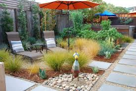This backyard stone patio goes well into the woods, being a small distance away from the house and completely covered by a thin canopy of trees. 23 Landscaping Ideas For Small Backyards