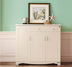 Each cabinet features vertical vented doors and magnetic closures. China Shoe Cabinet Modern Contracted Small Door Hall Ark Household Shoe Ark Multifunctional Economic Shoe Rack China Shoe Rack Shoe Cabinet