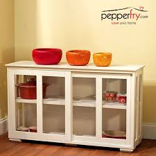 Pin By Pepperfry Com On Storage Ideas Glass Cabinet Doors Kitchen Cabinet Storage White Kitchen Storage Cabinet
