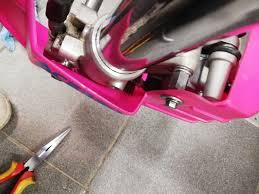 Homemade brackets for the brake disc cover.