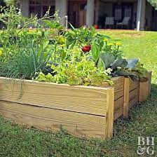 This Diy Raised Garden Bed Will Make Growing Veggies And Flowers Easier Building A Raised Garden Vegetable Garden Raised Beds Raised Garden