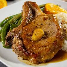 Simple Pan Seared Pork Chops Simmered In A Sticky Citrus Sauce Of Orange And Ginger For A Delicious And Quick Dinner Ginger Pork Ginger Recipes Pork