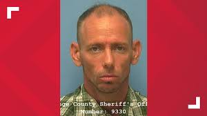 Suspect in custody after becoming trapped in burning home