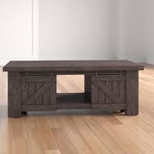 This table features three storage cabinets and a large hidden compartment beneath the tabletop. Birch Lane Sherree Solid Wood Lift Top Coffee Table With Storage Reviews Wayfair