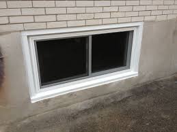 How to trim a basement window — when trimming windows in thick walls, you'll need wide extension jambs and thick stools. How To Replace A Basement Window Well With Metal Frame In Concrete Block Glass Blocks Wall Video Basement Windows Glass Block Installation Glass Block Windows