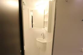 There is a separate shower and toilet area! 21 Earthroamer Interior Ideas Interior Dark Interiors Overland Trailer