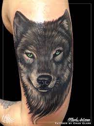 Your wolf tattoo doesn't necessarily need to feature an image of a wolf. Tattoo Uploaded By Top Hat Classic Tattoo Top Hat Classic Tattoo Cape Coral Florida Tattoos By Chad Clark C Clarkart Wolftattoo Realism Greeneyes 841815 Tattoodo