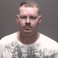 Man pleads to drunken driving, grabbing officer's gun