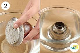 Let the shower head soak in the vinegar for a few hours. How To Clean A Shower Head With Baking Soda And Vinegar Fab How