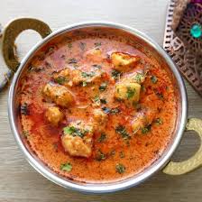 Chicken Thigh Fillets Marinated With Yoghurt And Tandoori Paste And Cooked In A Tomato And Cream Based Gr Butter Chicken Bone In Chicken Recipes Tandoori Paste