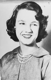 Cherished family photo of Joann with parents